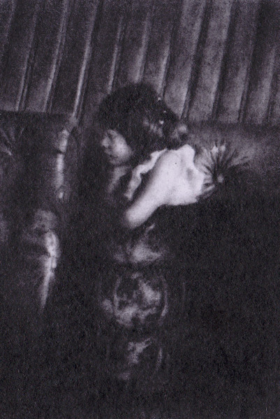 Pencil drawing of young girl held by gorilla